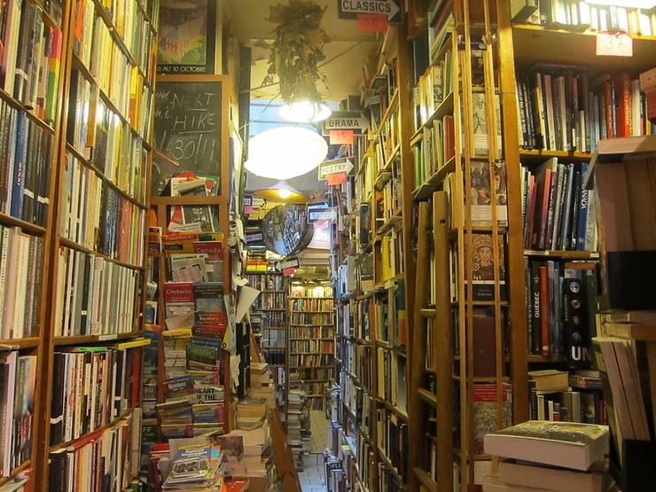 books piled floor to ceiling in the Abbey Bookstore, the perfect spot for a winter afternoon
