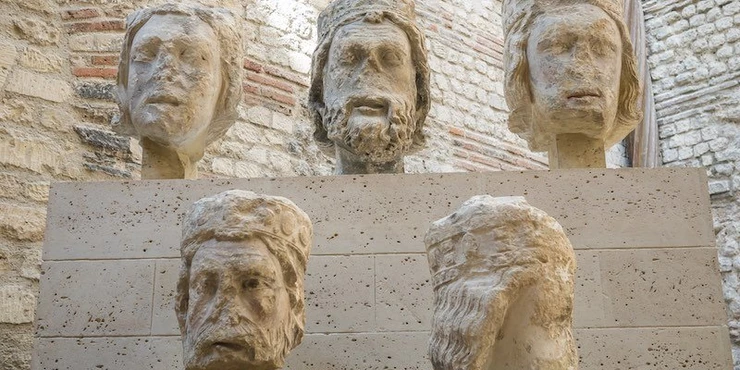 stone heads originally on the facade of Notre Dame