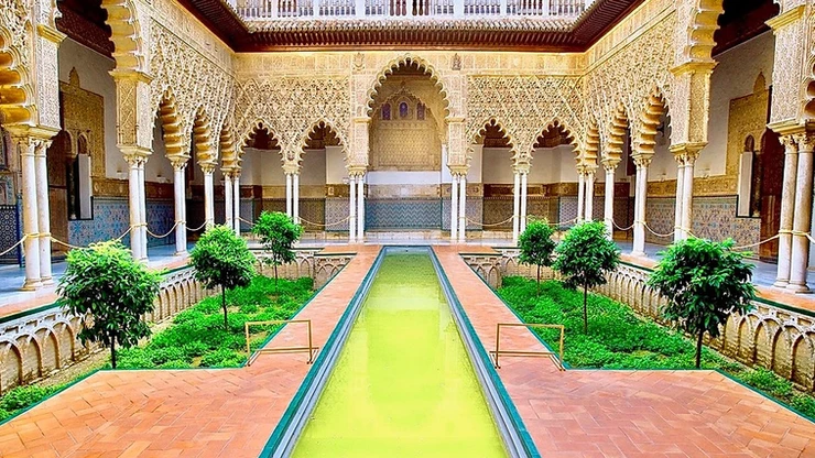 Courtyard of the Maidens in the Royal Alcazar, a stunning palace that should be on your Spain bucket list