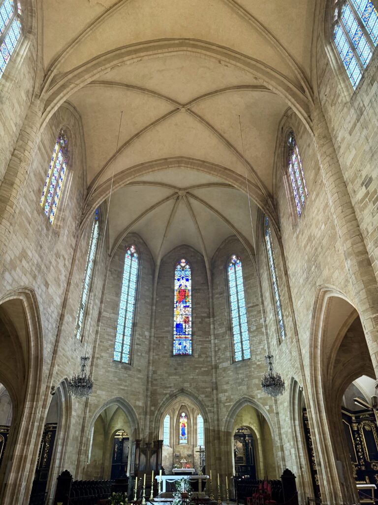 interior of Sarlat Cathedral with stained glass windows